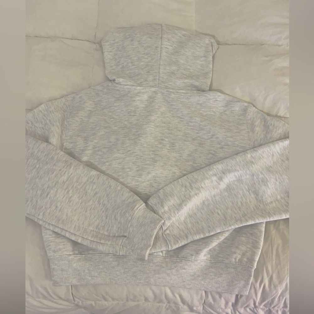 Gray cropped New York zip up hoodie in a size medium!
